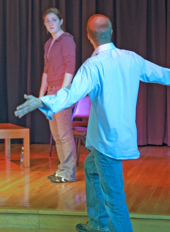 FAIRCHILD AIR FORCE BASE, Wash. -- Lyra Brennan and Ben Lambert, both actors from Boston, perform in the interactive play 'Remote Control,' here Aug. 15. The play, which is an existing play, but was rewritten for the military community, made it's debut here before moving on to other military installations.  (U.S. Air Force/Staff Sgt. Kristian Carter)