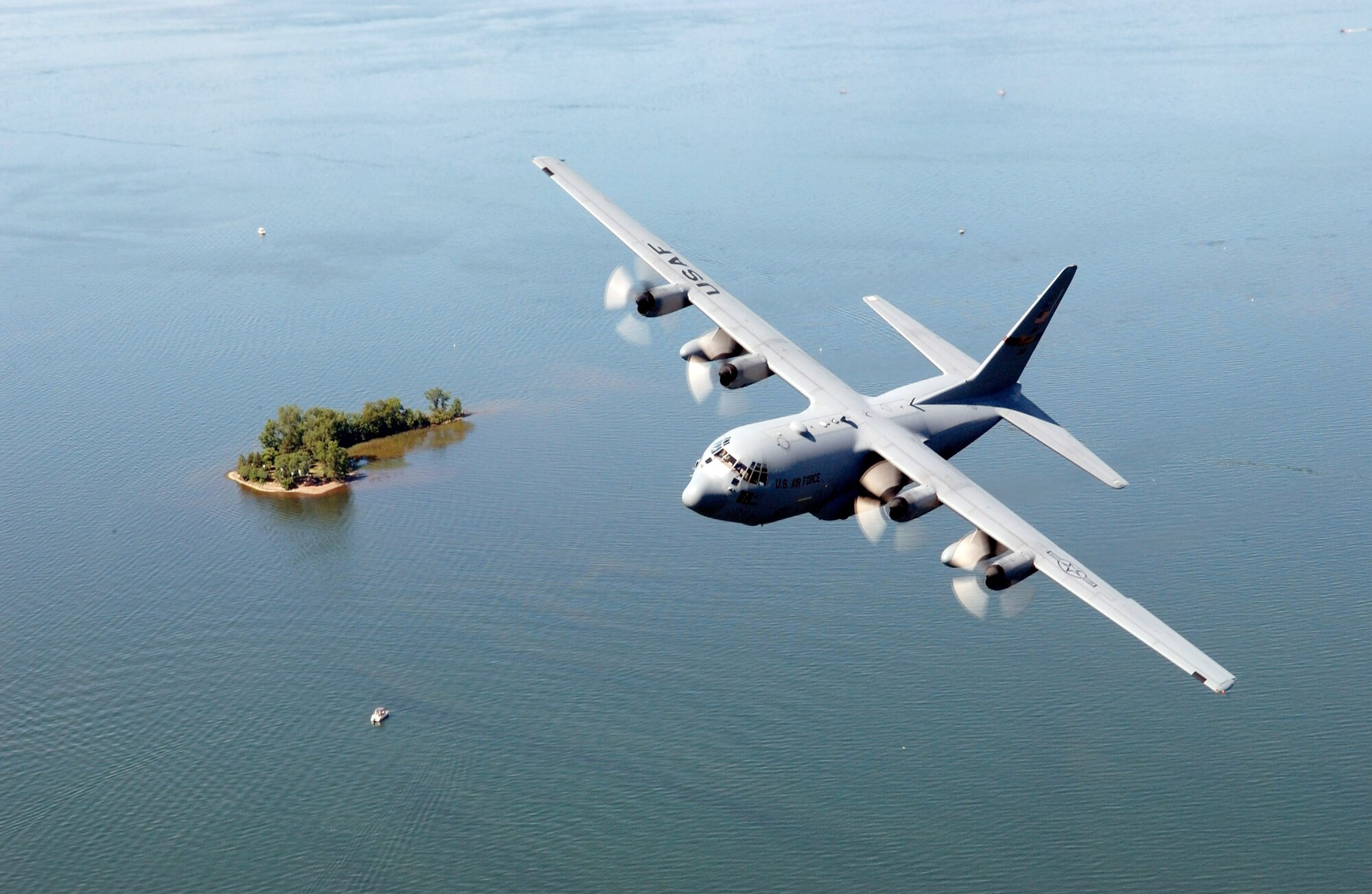 A C-130 Hercules from the Minnesota Air National Guard's 133rd Airlift Wing flies over the Mille Lacs Lake area in northern Minnesota during a training mission Aug. 20. (U.S. Air Force photo/Tech. Sgt. Erik Gudmundson) 

