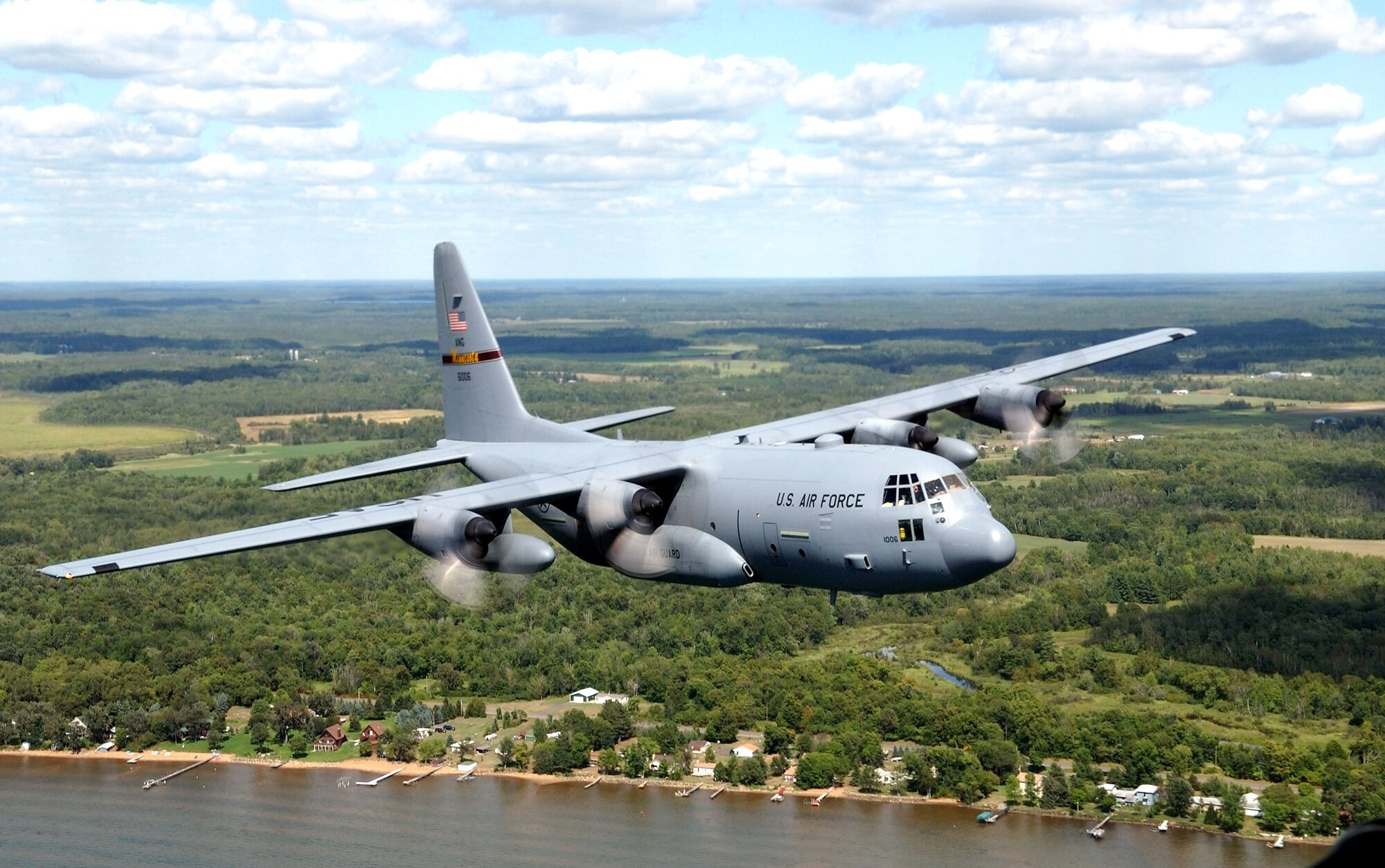 A C-130 Hercules from the Minnesota Air National Guard's 133rd Airlift Wing flies over the shore of Mille Lacs Lake area in northern Minnesota during a training mission Aug. 20. (U.S. Air Force photo/Tech. Sgt. Erik Gudmundson) 
