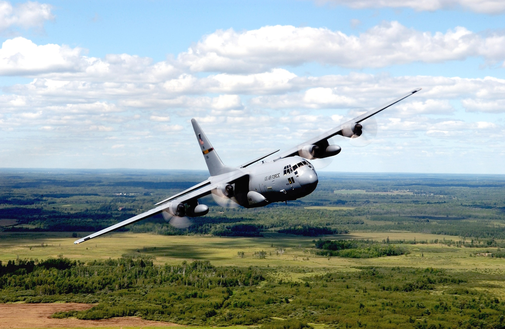 A C-130 Hercules from the Minnesota Air National Guard's 133rd Airlift Wing banks hard over the Mille Lacs Lake area in northern Minnesota during a training mission Aug. 20. (U.S. Air Force photo/Tech. Sgt. Erik Gudmundson)

