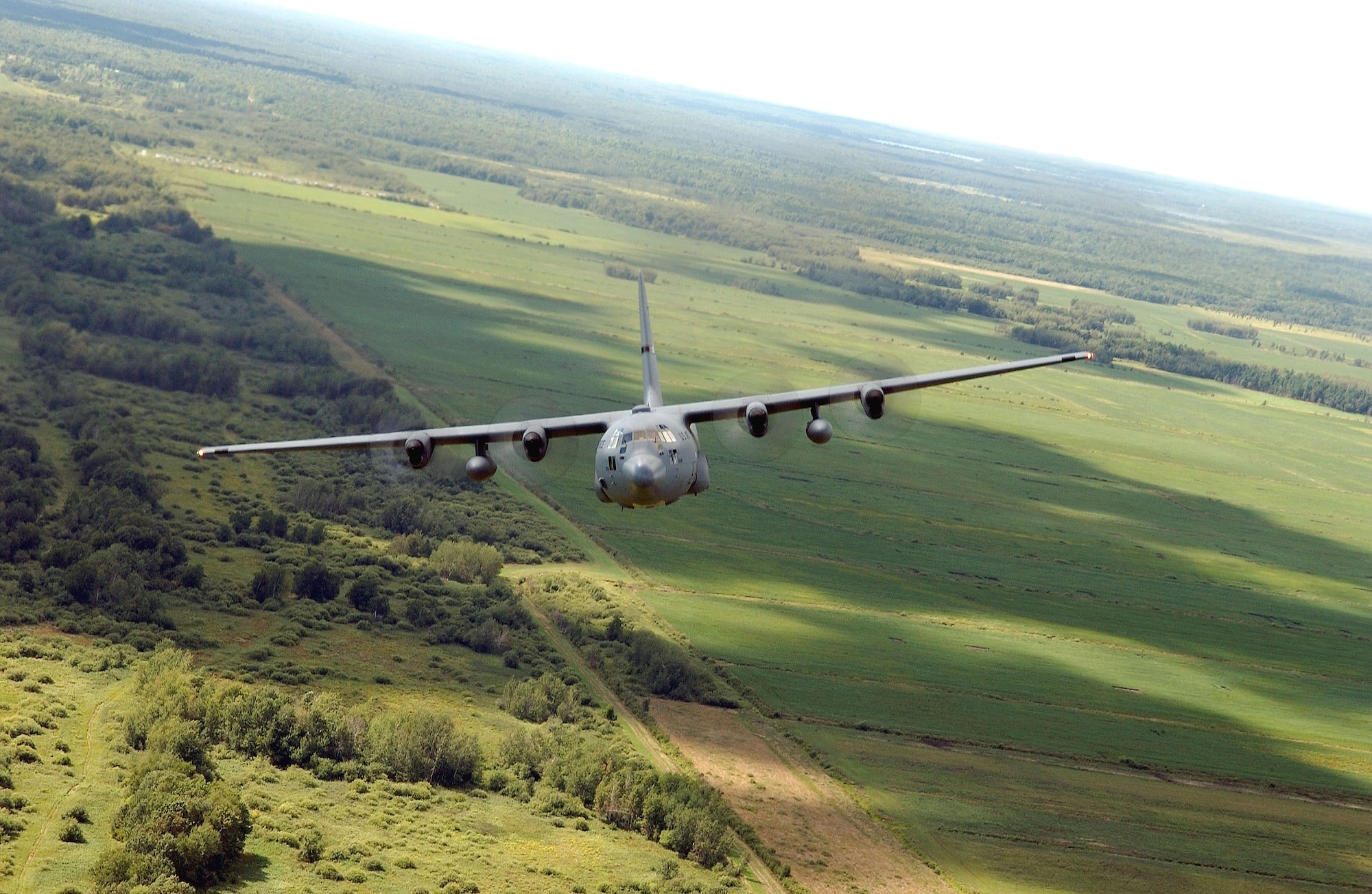 A C-130 Hercules from the Minnesota Air National Guard's 133rd Airlift Wing banks hard over the Mille Lacs Lake area in northern Minnesota during a training mission Aug. 20. (U.S. Air Force photo/Tech. Sgt. Erik Gudmundson) 
