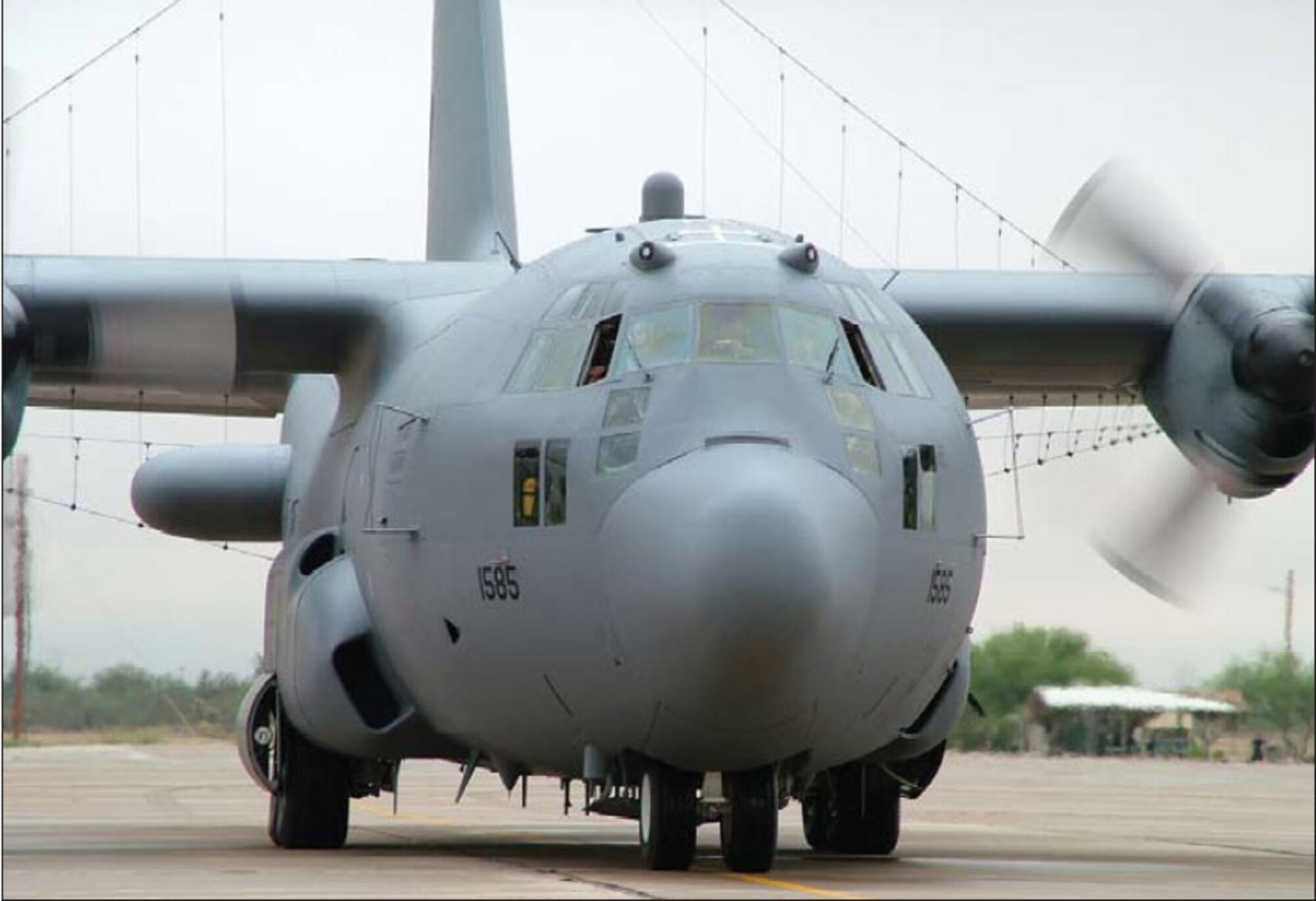 The new Block 35 EC-130H aircraft is ferried in during a welcoming formation. Within the next five years, every EC-130H will have the Block 35 advanced technology installed, enhancing the Compass Call Mission. (U.S. Air Force photo/Shelly A. McGuire)