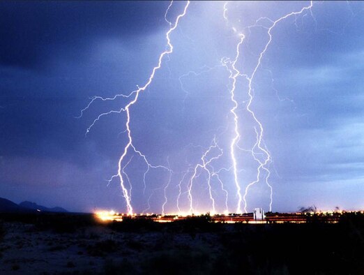 Lightning strikes like this one in Las Cruces, N.M., can happen here at Eglin Air
Force Base. When “lightning within five” is annouced Airmen should take cover
as quickly as possible. Smoke shacks and sun shades do not provide adequate
cover. (U.S. Air Force photo/Edward Aspera Jr.)