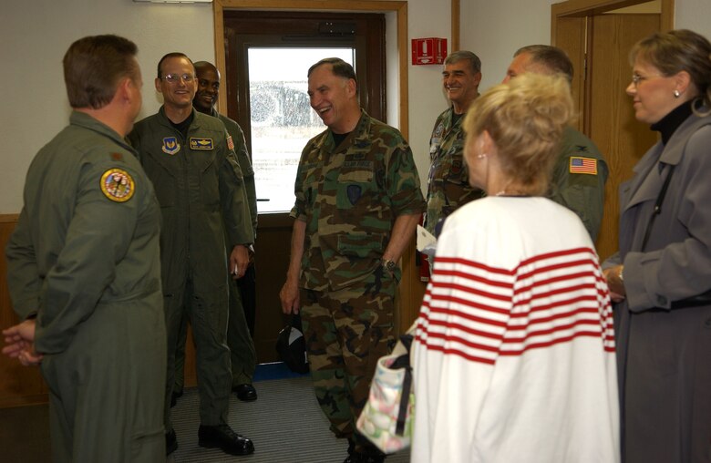 Col. Rich Johnston, KMC and 86th Airlift Wing commander, escorts General Hobbins at the 37th Airlift Squadron.
