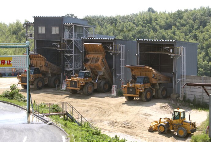 Three crushers take dirt blasted from the mountain and crush it to roughly less than 12 inches in diameter.