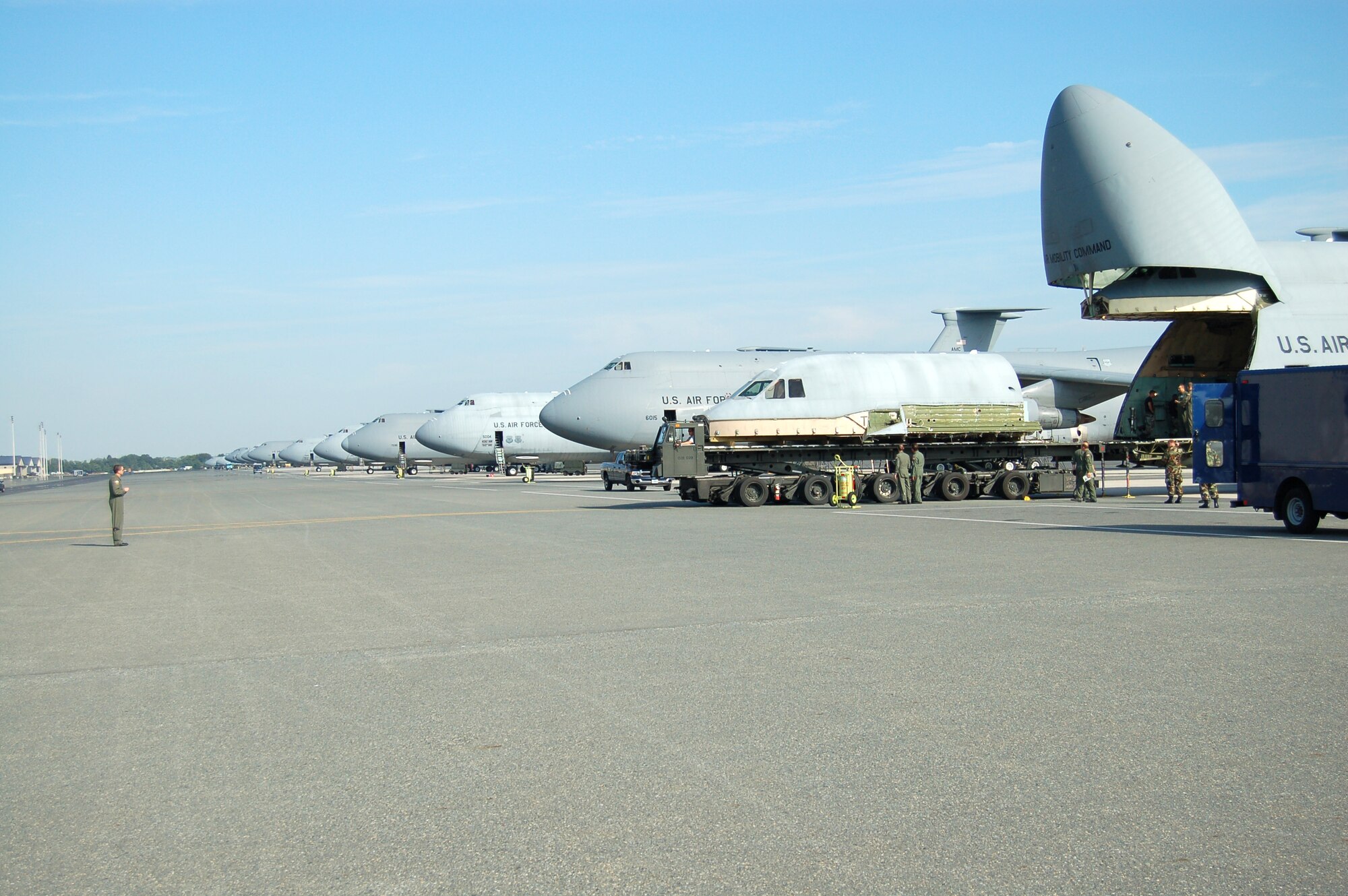 The flight deck from the April 3 C-5 mishap is loaded onto another C-5 at Dover Air Force Base, Del., for transport to Robins Air Force Base, Ga., Aug. 22. The flight deck will be used to as a training simulator to help prevent future C-5 mishaps. (U.S. Air Force photo/Airman 1st Class James Bolinger)