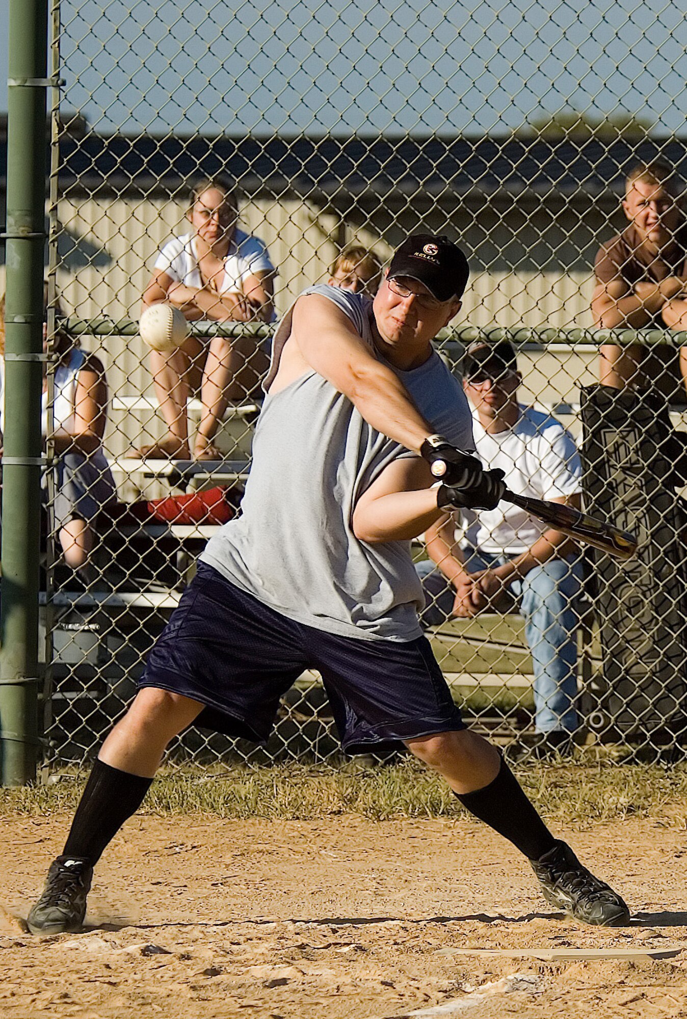 Andrew Bishop, LRS right fielder, swings during game one of the two-game series. Bishop was one-for-three at bat. He grounded out twice, once in the second inning and once in the fifth. In the seventh, he crushed a grounder past second base for a single. (U.S. Air Force photo/Roland Balik)