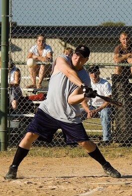 Andrew Bishop, LRS right fielder, swings during game one of the two-game series. Bishop was one-for-three at bat. He grounded out twice, once in the second inning and once in the fifth. In the seventh, he crushed a grounder past second base for a single. (U.S. Air Force photo/Roland Balik)