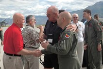 Pilots with the 34th Fighter Squadron greet vets who were stationed with the 388th Fighter Wing during the Vietnam War.