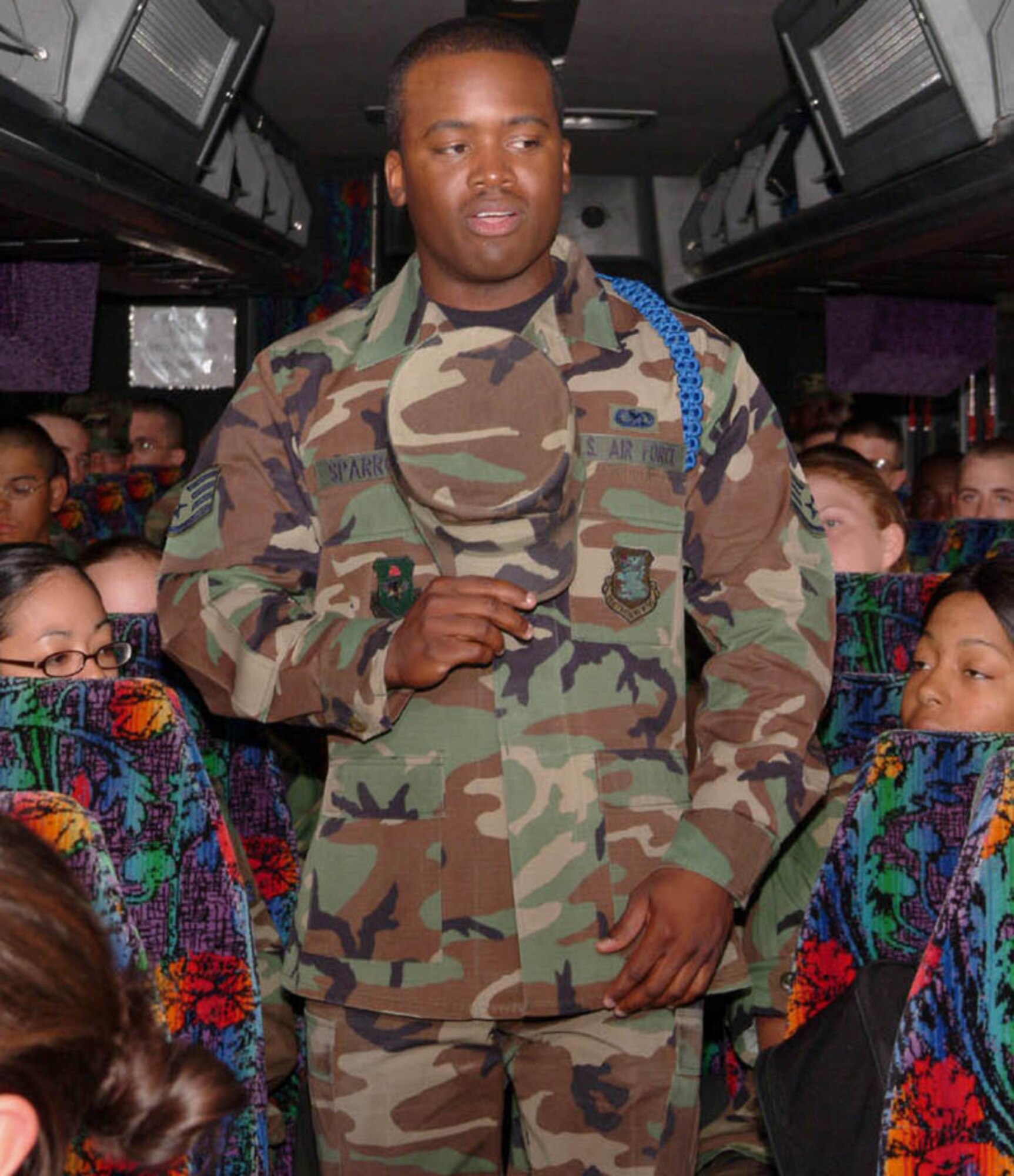 Staff Sgt. Chuck Sparrow, 81st Training Group military training leader, gives newly-arriving Airmen from Lackland Air Force Base, Texas, instructions before they leave the bus after arriving at Keesler AFB Oct. 31 . (U.S. Air Force photo by Herb Welch)