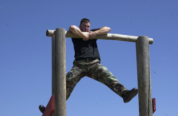 Senior Airman Mathew Masciorini, from the 460th Security Forces Squadron Guardian Challenge team, completes the obstacle course at the Guardian Challenge. (U.S. Air Force photo by Airman 1st Class Michelle Cross )                               