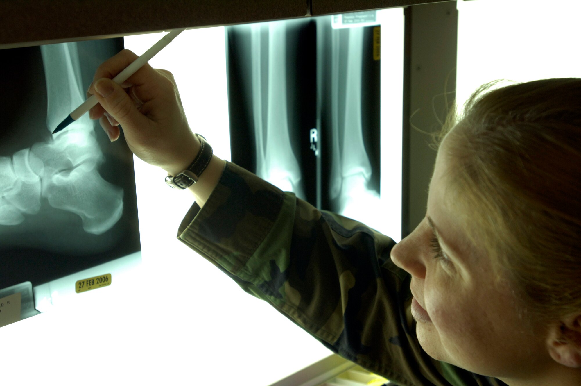 Staff Sgt. Jennifer Martin, 92nd Medical Support Squadron diagnostic imaging technician, inspects an ankle x-ray to ensure proper exposure and positioning. (U.S. Air Force photo/Tech. Sgt. Laura Smith)