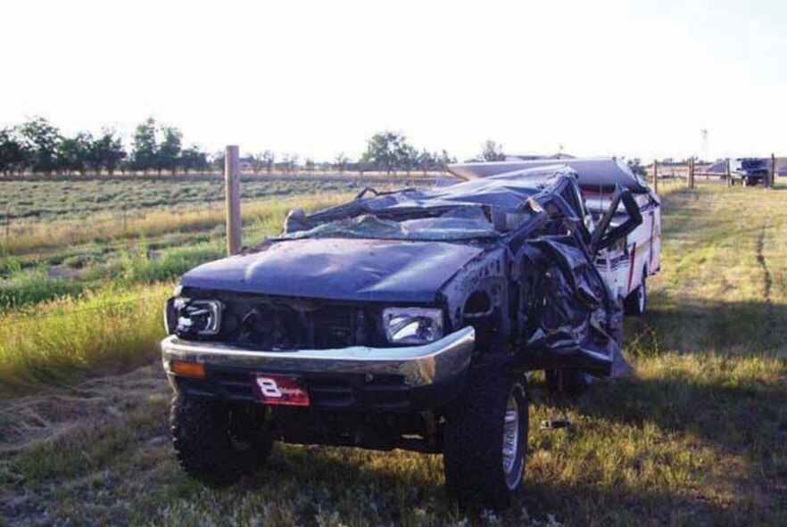 MINOT AIR FORCE BASE N.D. -- Staff Sgt. Jennifer Farley, 5th Munitions Squadron,  was driving this sport utility vehicle  when a vehicle mishap caused it to roll about two-and-a-half times before resting upside-down. The mishap resulted in only injuries, but according to officials, it could have been fatal if seat belts not been used. (courtesy photo)