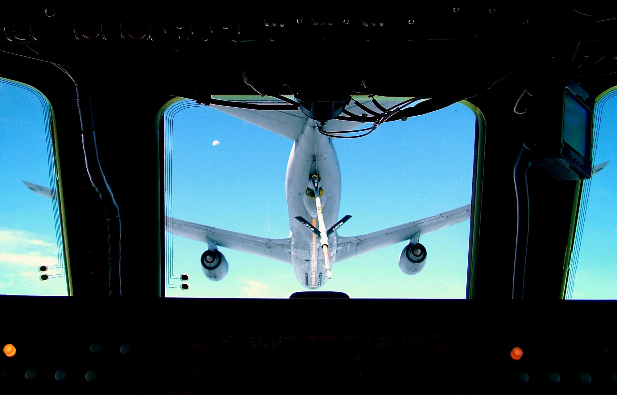 A 512th Operations Group aircrew prepares to "hit a tanker" from the 319th Air Refueling Wing, Grand Forks Air Force Base, N.D.  About 40 local clergy members recieved an orientation flight Aug. 14 as part of Clergy Day at Dover Air Force Base, Del. The 512th OG is part of the Air Force Reserve Command's 512th Airlift Wing.