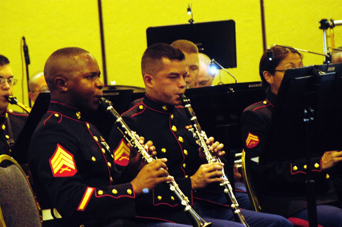 ATLANTA - Cpl. Michael Yang and Sgt. Herbert Green, clarinetists in the Marine Forces Reserve Band, join the band inâ??Pirates of the Caribbeanâ? by Klaus Badelt. The piece was an overture of the blockbuster film of the same name. (Official U. S. Marine Corps photo by Lance Cpl. Frans E. Labranche)
