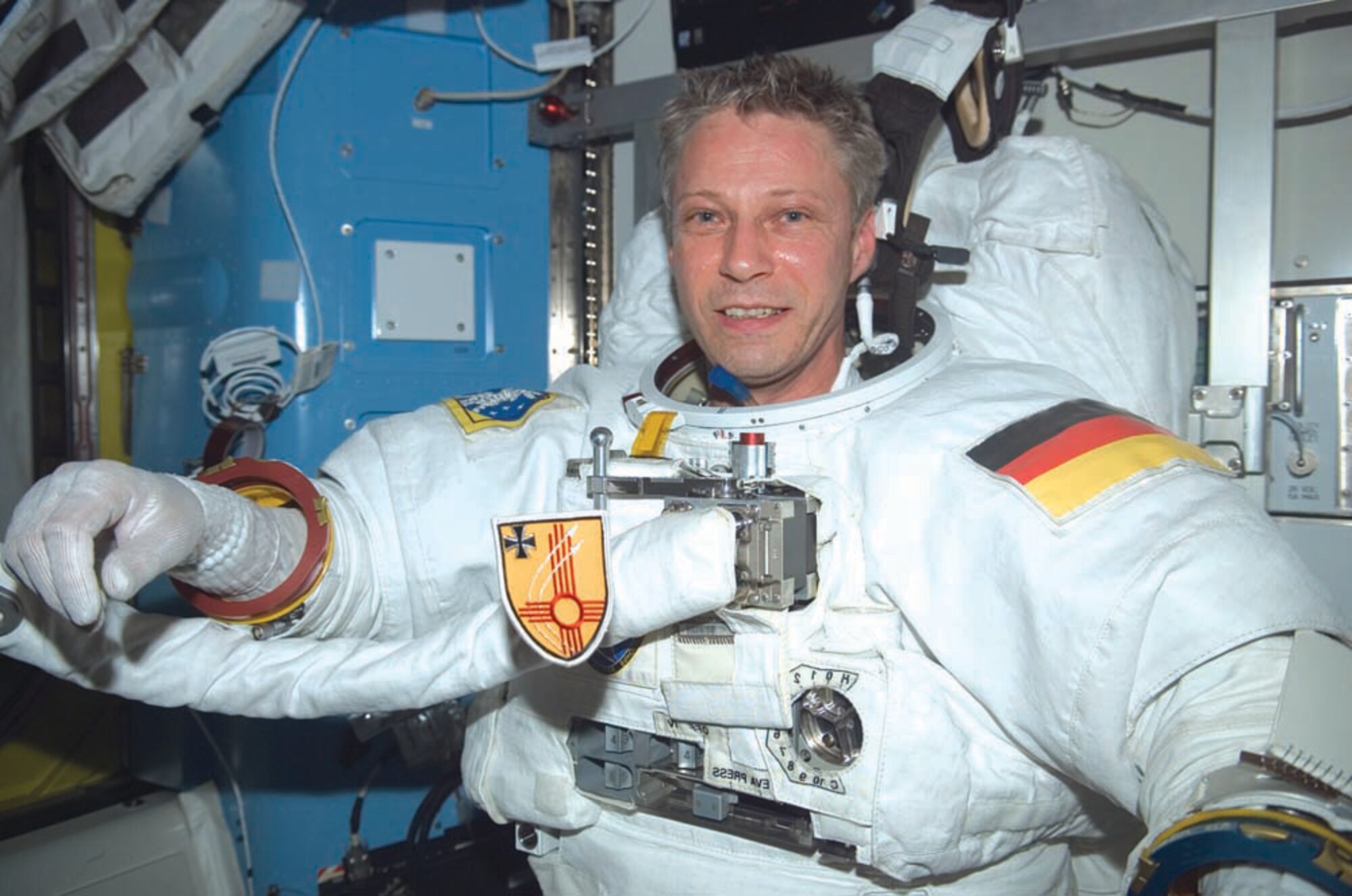 Thomas Reiter displays his German air force patch while aboard the Space Shuttle. He is currently on-board the International Space Station.