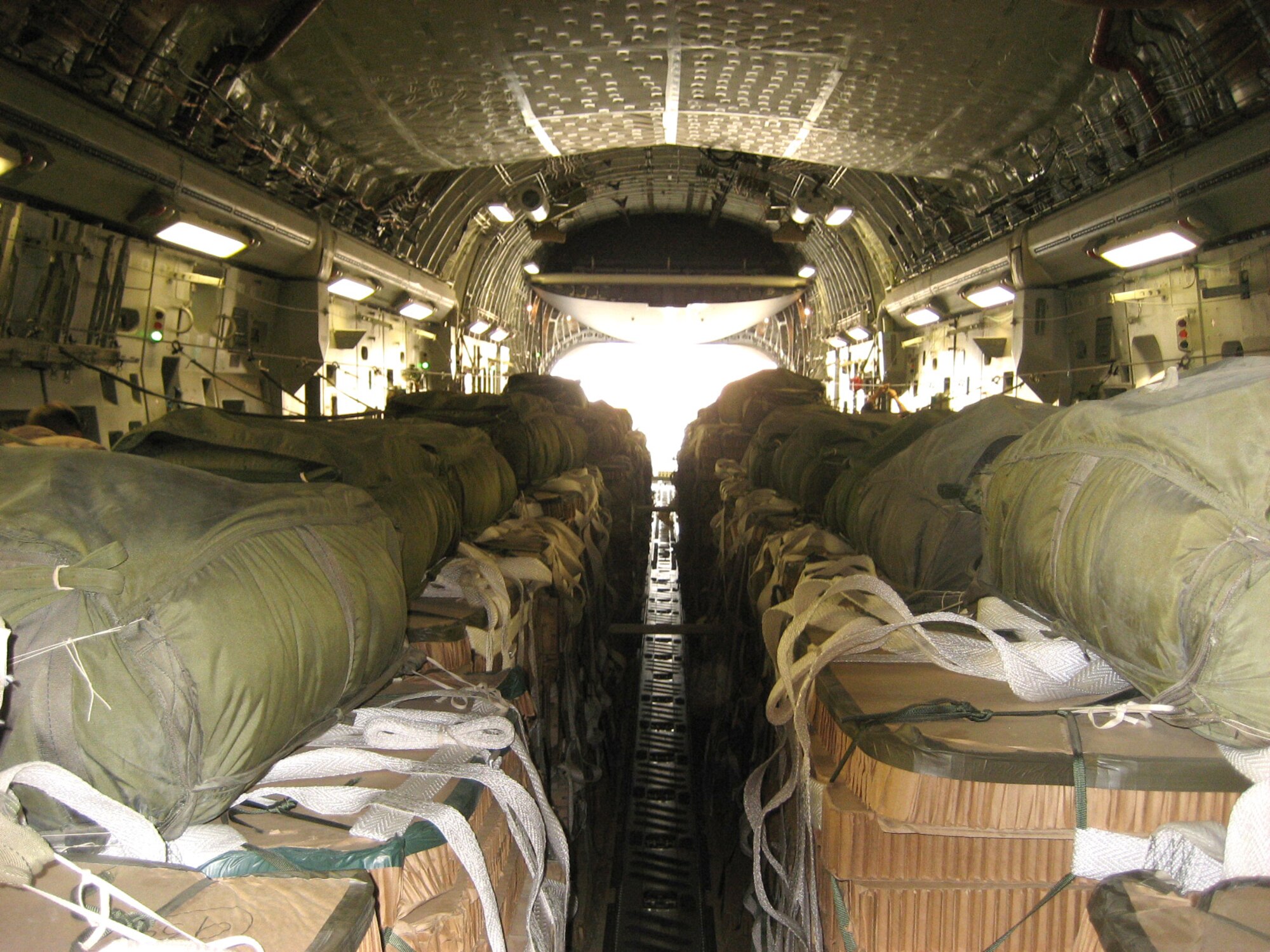 A load of 50,000 pounds of ammunition waits in a C-17 Globemaster III at Manas Air Base, Kyrgyzstan, Aug. 23 before being airdropped to Soldiers in Afghanistan engaged in combat with anti-coalition forces. (U.S. Air Force photo/1st Lt. David Myrick)
