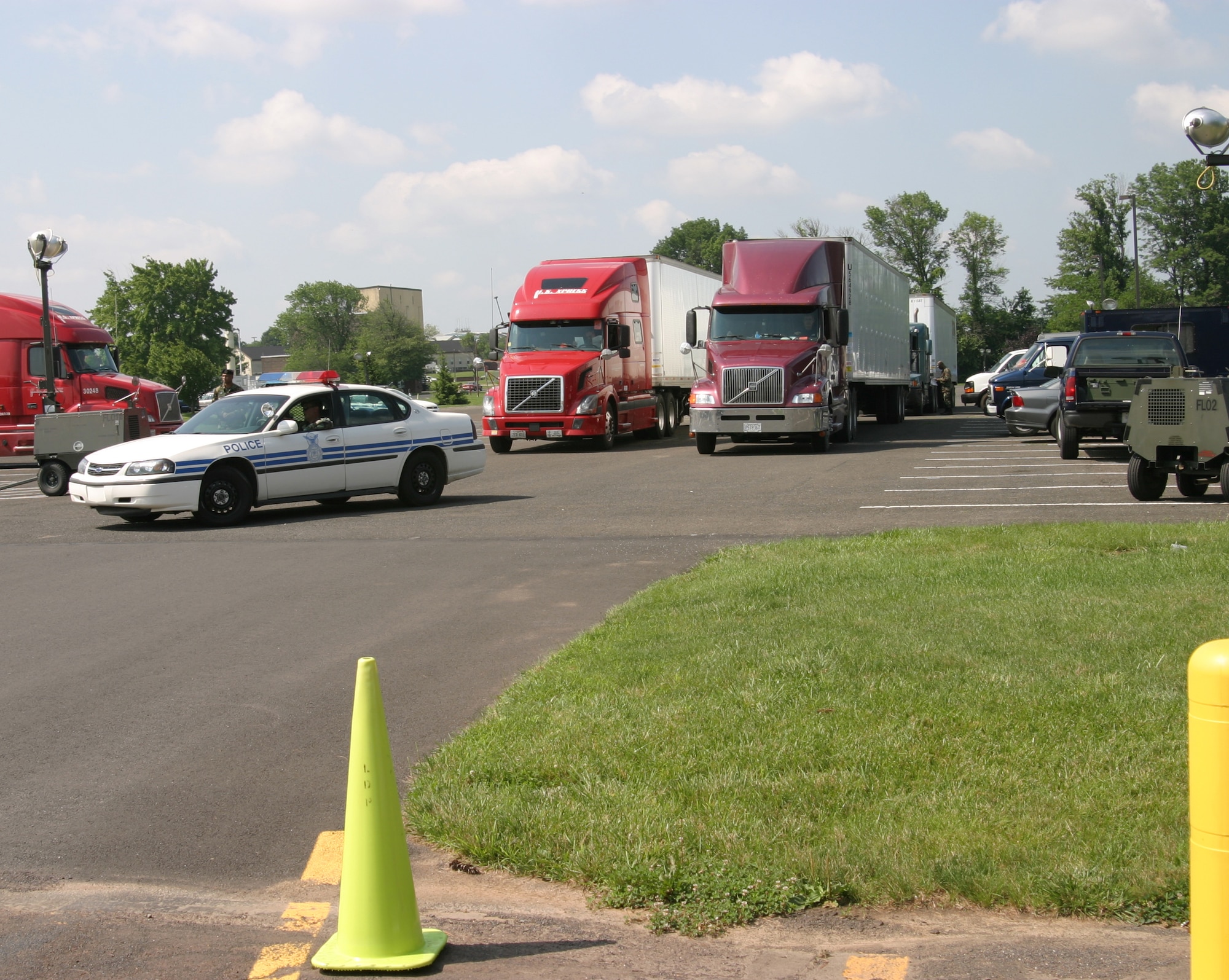Trucks are being pre-positioned at various staging points around the country to accelerate the delivery of supplies to disaster victims. This processing area is at Willow Grove Air Reserve Station, Pa. (U.S. Air Force photo/Capt. Mark Medvesky)
