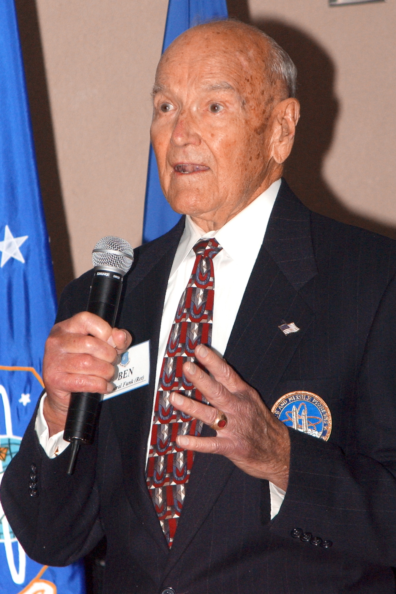 Retired Maj. Gen. Ben I. Funk takes his place in the Air Force Space and Missile Pioneers Hall of Fame in a ceremony Aug. 24 at Headquarters Air Force Space Command at Peterson Air Force Base, Colo. (U.S. Air Force photo by Duncan Wood)         