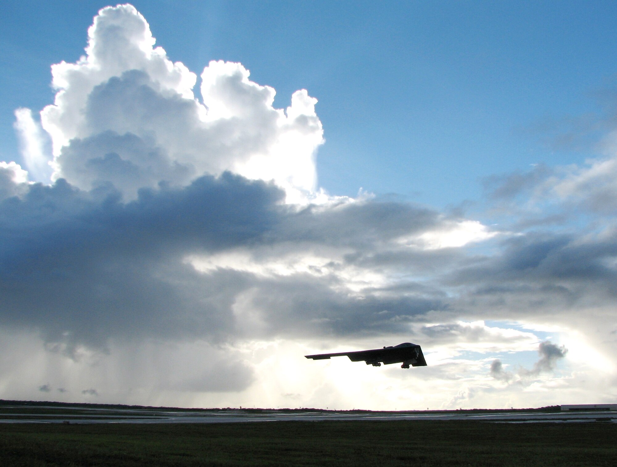 A B-2 Spirit from the 13th Expeditionary Bomb Squadron departs on a training mission during one of the final sorties of a four-month deployment to Andersen Air Force Base, Guam, Aug. 24. The 13th and 393rd EBS flew more than 140 sorties and released more than 330 weapons during the deployment. B-2 aircraft, pilots, maintainers and support staff deployed from the 509th Bomb Wing at Whiteman AFB, Mo. (U.S. Air Force photo/Tech. Sgt. Mikal Canfield) 