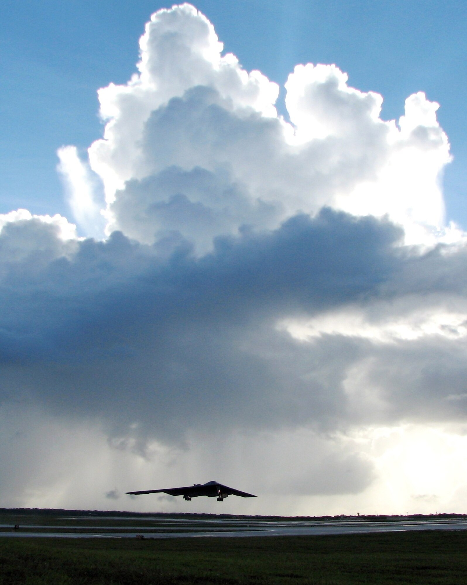 A B-2 Spirit from the 13th Expeditionary Bomb Squadron departs on a training mission during one of the final sorties of a four-month deployment to Andersen Air Force Base, Guam, Aug. 24. The 13th and 393rd EBS flew more than 140 sorties and released more than 330 weapons during the deployment. B-2 aircraft, pilots, maintainers and support staff deployed from the 509th Bomb Wing at Whiteman AFB, Mo. (U.S. Air Force photo/Tech. Sgt. Mikal Canfield) 