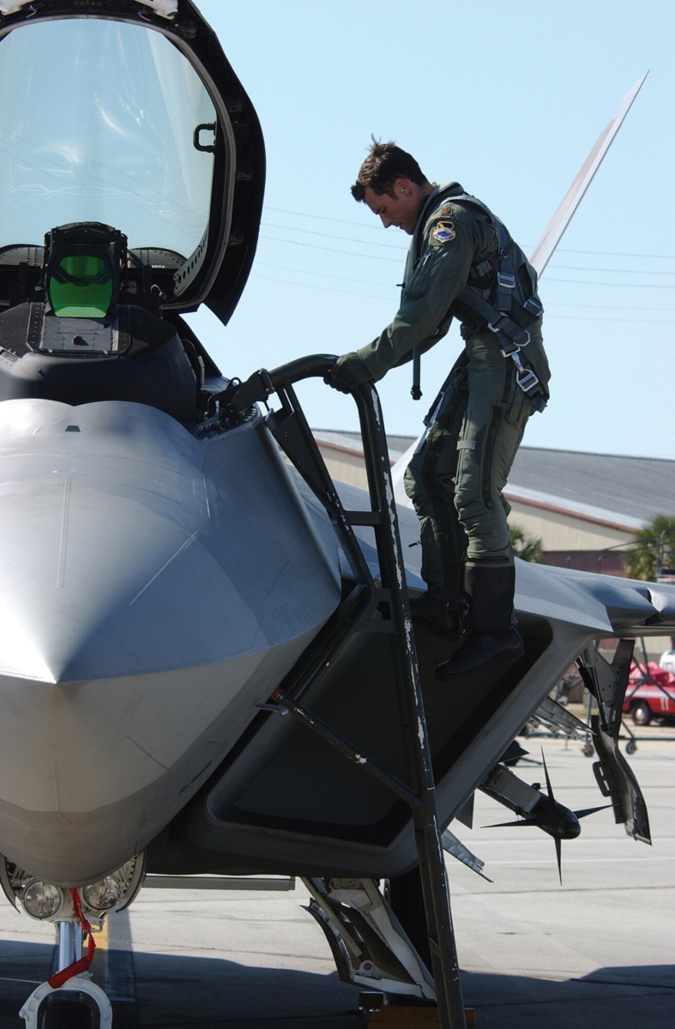 Maj. Paul Moga, 43rd FS instructor pilot, returns from his flight at the completion of the "war." Two Raptors joined 12 1st FS "Fury" Eagles and a KC-135 to form the defensive counter air package, known as "Blue Air." (U.S. Air Force photo by 2nd Lt. William Powell)