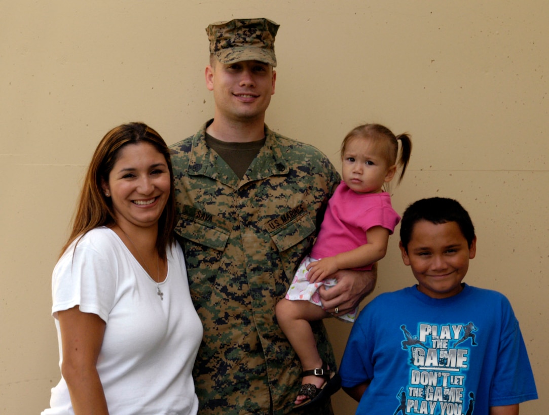 The Sava family, U.S. Marine Corps Staff Sgt. Danny Sava, his wife Julia, son Anthony and daughter Alyssa, are preparing for Danny’s upcoming deployment with the 15th Marine Expeditionary Unit, with help from the extensive family support network at Camp Pendelton, Calif., Aug. 23, 2006.  