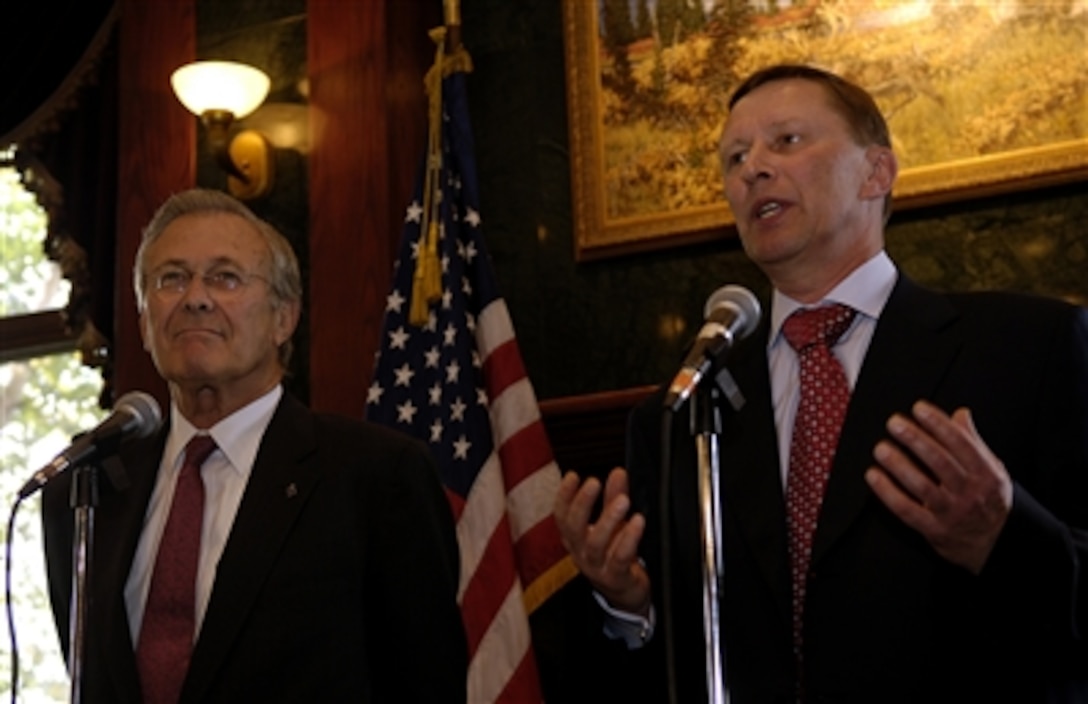 U.S. Defense Secretary Donald H. Rumsfeld, left, stands next to Russian Defense Minister Sergei Ivanov as he responds to a question during a news conference in Fairbanks, Alaska, Aug. 27, 2006.