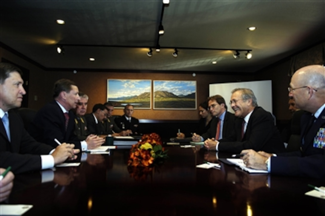 Secretary of Defense Donald H. Rumsfeld (2nd from right) meets with Russian Minister of Defense Sergei Ivanov (2nd from left) in Fairbanks, Alaska, on Aug. 27, 2006.  Rumsfeld, Ivanov and their senior advisors are meeting to discuss regional security issues.  Rumsfeld and Ivanov will later take part in a dedication ceremony of a memorial to U.S.-Soviet military cooperation during World War II.  