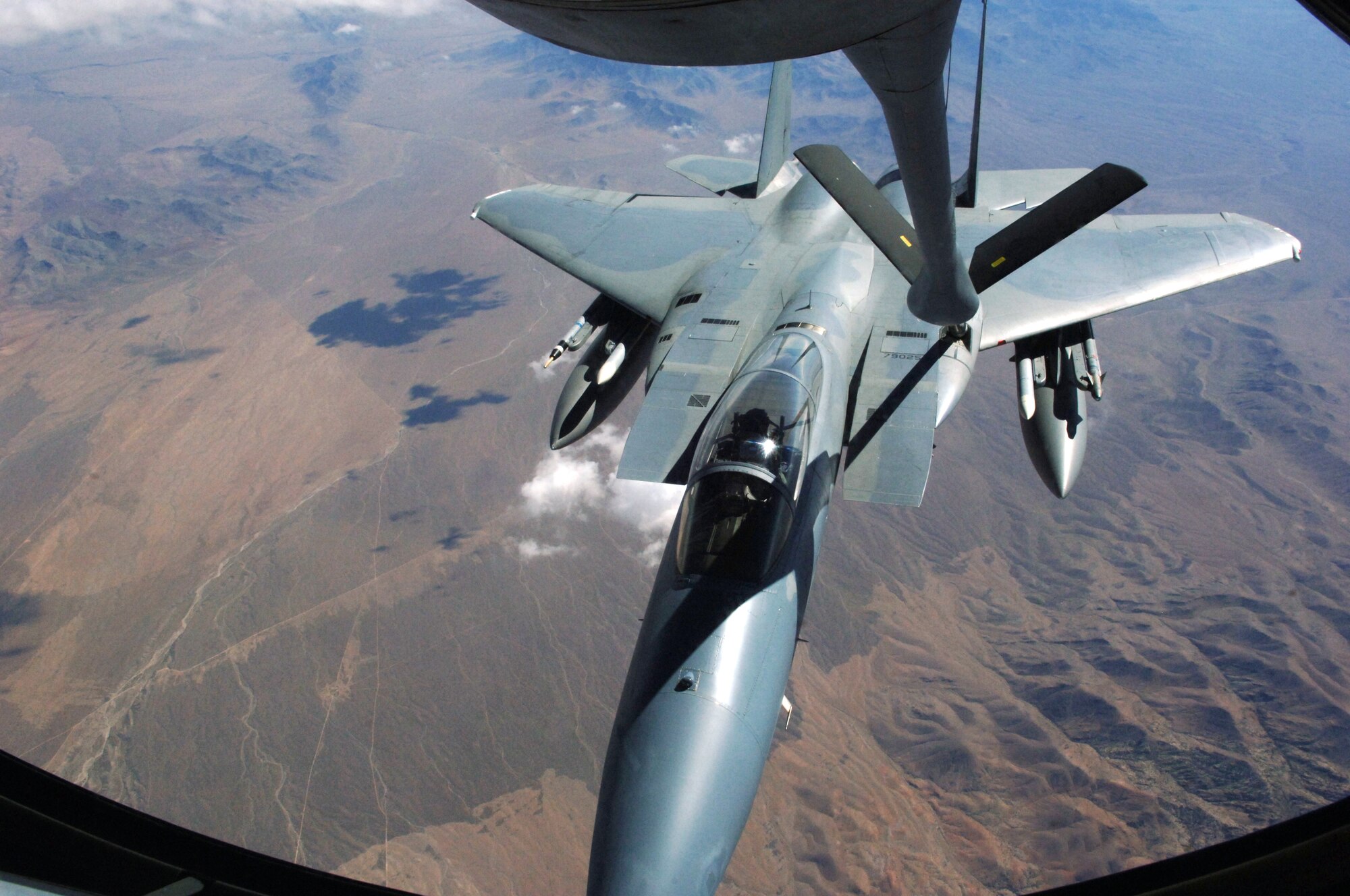 NELLIS AFB, Nev. -- An F-15 Eagle from Kadena Air Base, Japan, takes on fuel from a KC-135 tanker from the 6th Air Mobility Wing, MacDill AFB, Fla., Aug. 23 during exercise Red Flag. The KC-135s provide refueling support for both the Blue and Red forces, which typically number 80 aircraft or more. Red Flag hones the combat skills of U.S. and allied aircrews. (U.S. Air Force photo/Airman 1st Class Andy Dumboski)