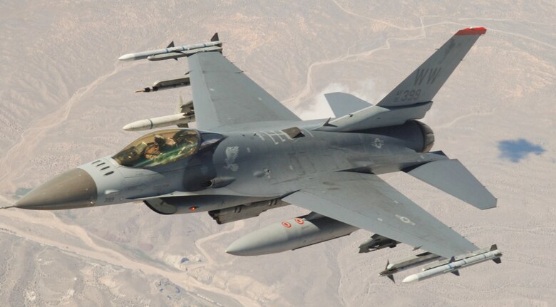 NELLIS AFB, Nev. -- An F-16CJ from Misawa Air Base, Japan,  flies over the Nevada Test and Training Range Complex Aug. 24 during exercise Red Flag. The F-16CJ specializes in neutralizing and destroying surface-to-air gun and missile sites. More than 80 aircraft take part in Red Flag exercises, which hone the skills of U.S. and allied aircrews. (U.S. Air Force photo/Senior Airman Travis Edwards)