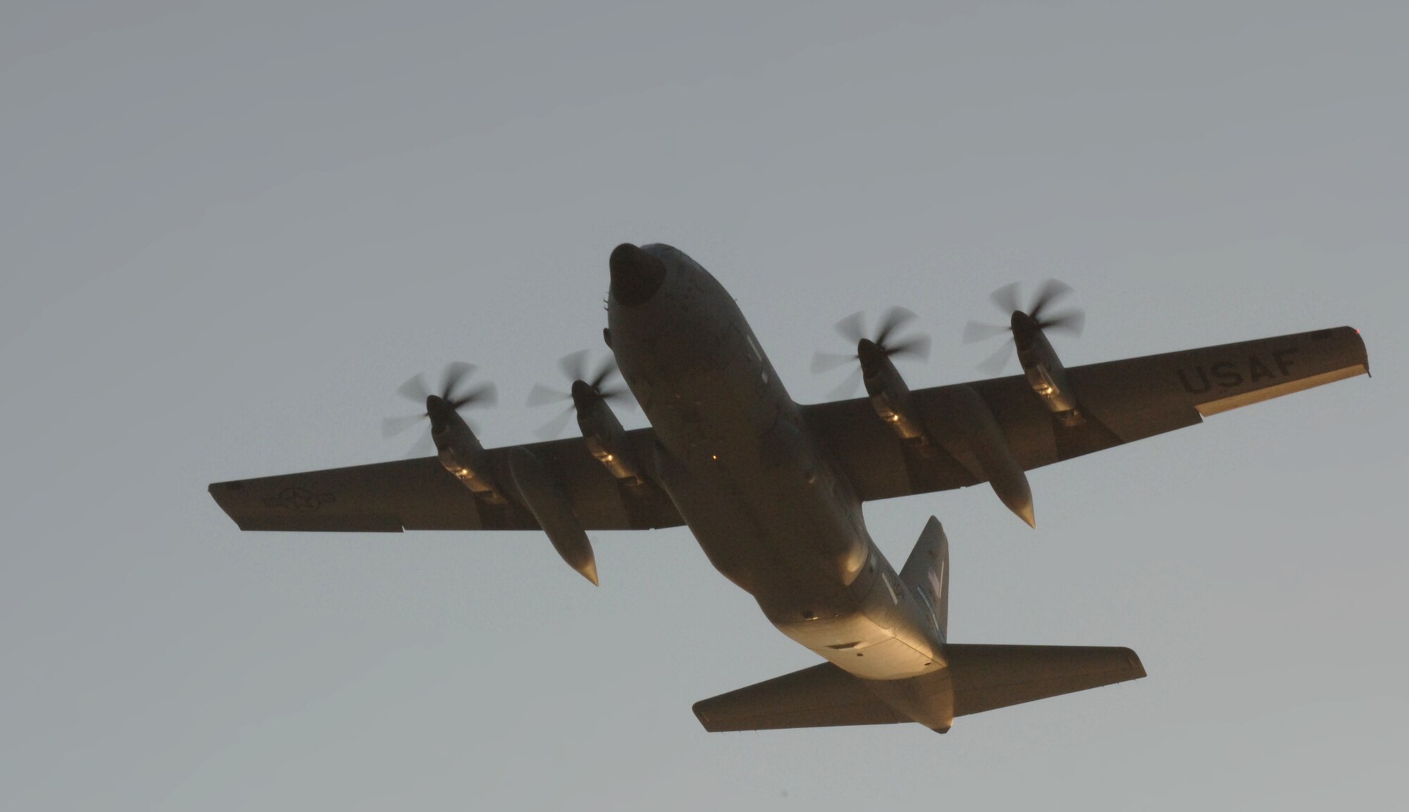 As the sun rises one-year after Hurricane Katrina devastated the Mississippi Gulf Coast, a WC-130J Hurricane Hunter flies over citizens of Gulfport, Miss. gathered in memory of those lost to the worst natural disaster to ever strike the United States. The Hurricane Hunters are assigned to Air Force Reserve Command's 403rd Wing, 53rd Weather Reconnaissance Squadron which provides data to the National Hurricane Center improving forecasts by as much as 30 percent.