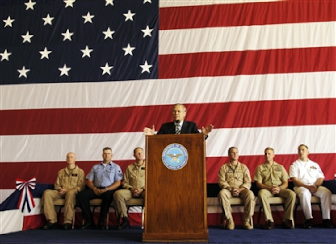 Secretary of Defense Donald H. Rumsfeld talks to an audience of sailors and civilian government employees during a town hall meeting at the Fallon Naval Air Station, Nev., on Aug. 28, 2006.  Rumsfeld addressed the audience then fielded questions on topics that ranged from health care policy to the global war on terrorism.  