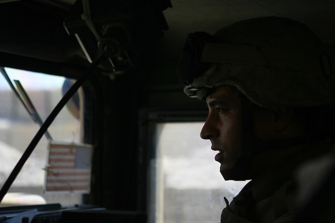 Vehicle Commander with Military Police Company, Combat Logistics Regiment 15, 1st Marine Logistics Group (Forward) Cpl. Brian S. Soscia is confident that their training in the states has equipped them with the necessary tools for their mission.  ?Whatever comes our way, we can handle it,? said Soscia, a 26-year-old native of Providence, R.I.  Staff Sgt. Keith S. Littreal, a 29-year-old native of Greensboro, N.C. and a platoon sergeant for 1st Platoon, MP Company, said that when confronted by the enemy, ?(These Marines) tend to respond with no fear, their adrenalin gets going? they respond flawlessly, like clockwork.?  In the combat zone, MP Company provides security for vehicle/personnel recovery teams, supply trucks, and also scans supply routes for IEDs and enemy activity.