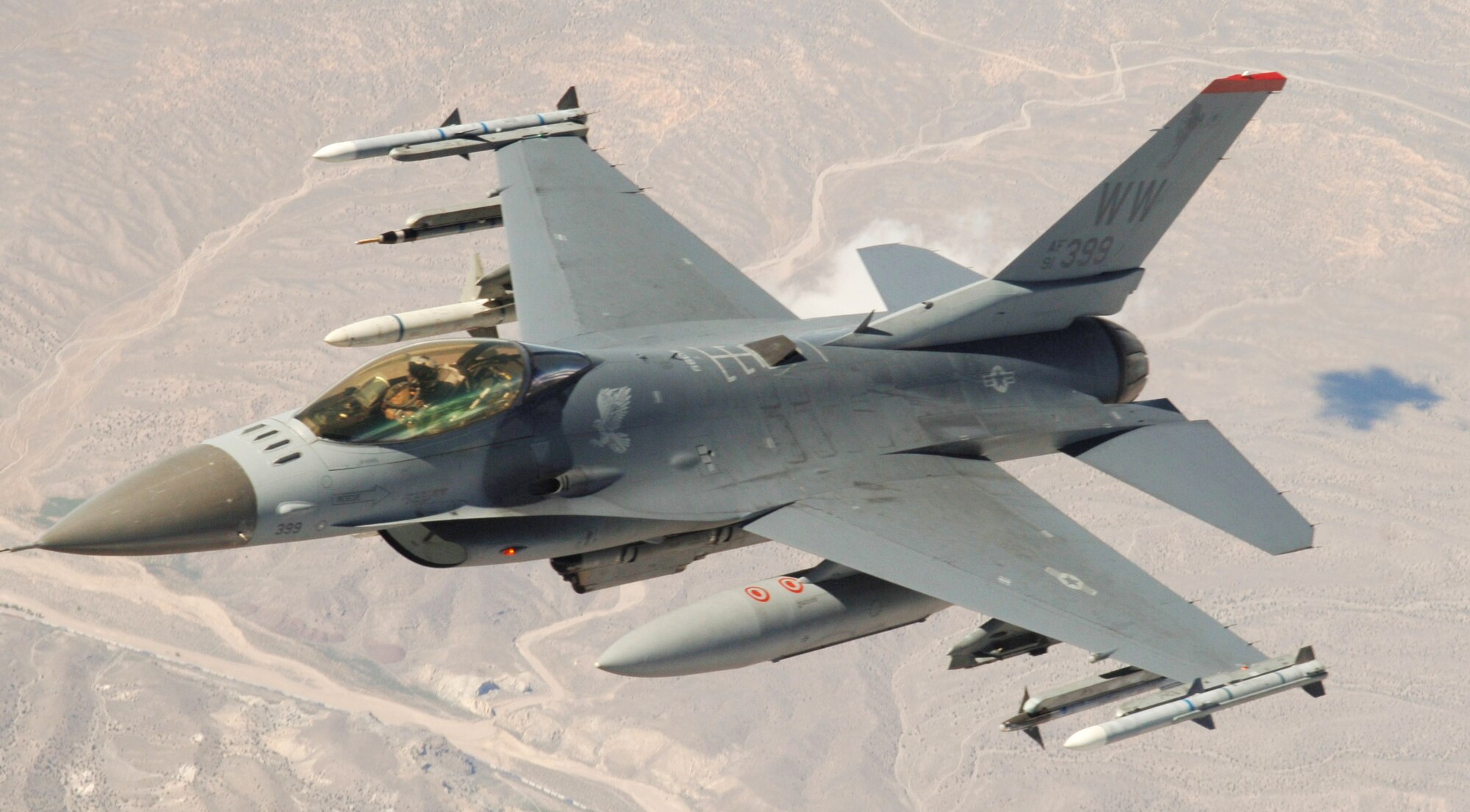 An F-16 Fighting Falcon from Misawa Air Base, Japan, flies at Red Flag, a two-week exercise that tests and trains servicemembers in real-time combat situations at Nellis Air Force Base, Nev. Red Flag is conducted over the Nevada Test and Training Range, which has more than 2.9 million acres of airspace. (U.S. Air Force photo/Senior Airman Travis Edwards)