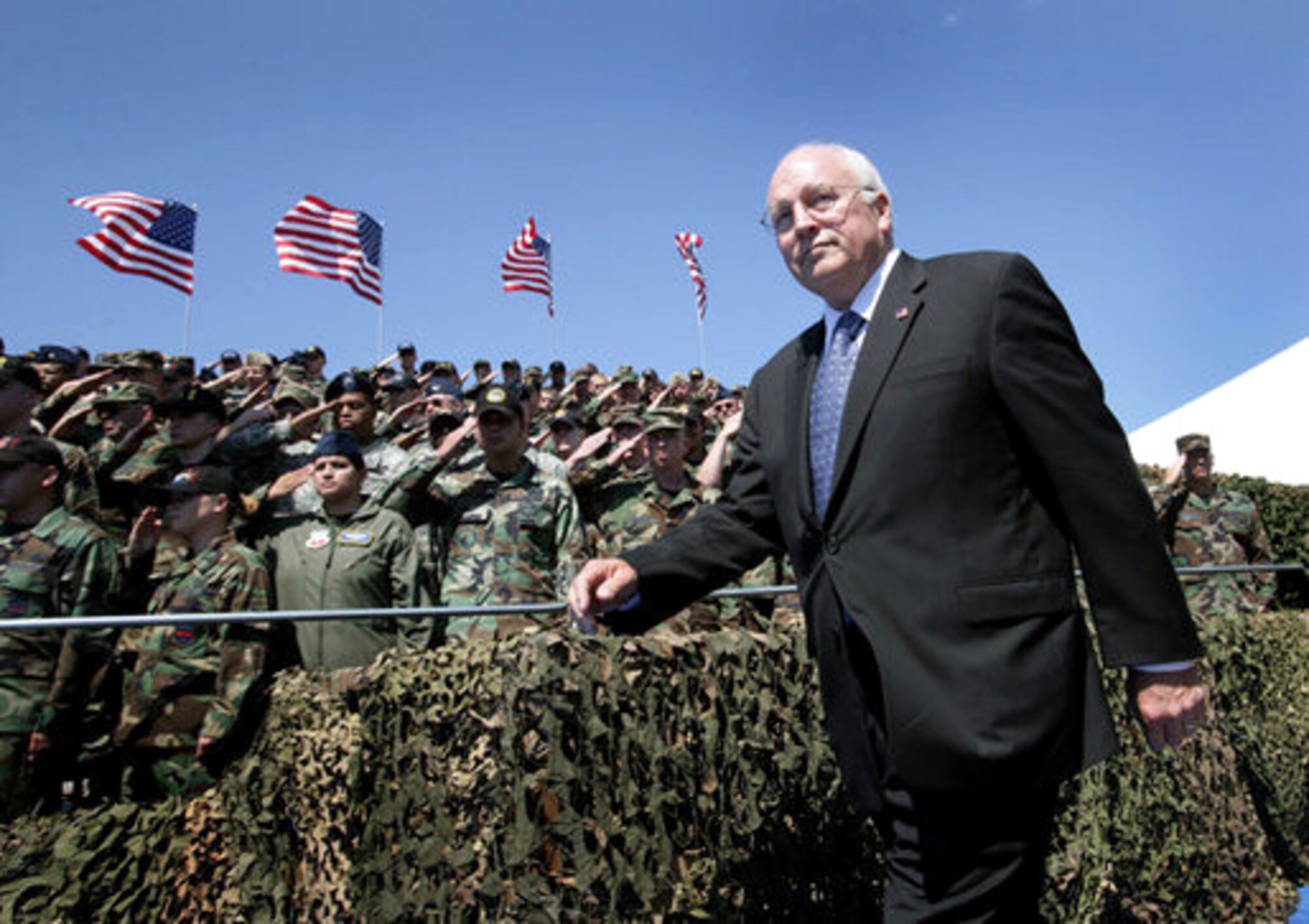 Servicemembers salute Vice President Dick Cheney upon his arrival at a rally for the troops Aug. 29 at Offutt Air Force Base, Neb. Offutt is home to the U.S. Strategic Command headquarters and the 55th Wing.  (White House photo/David Bohrer) 
