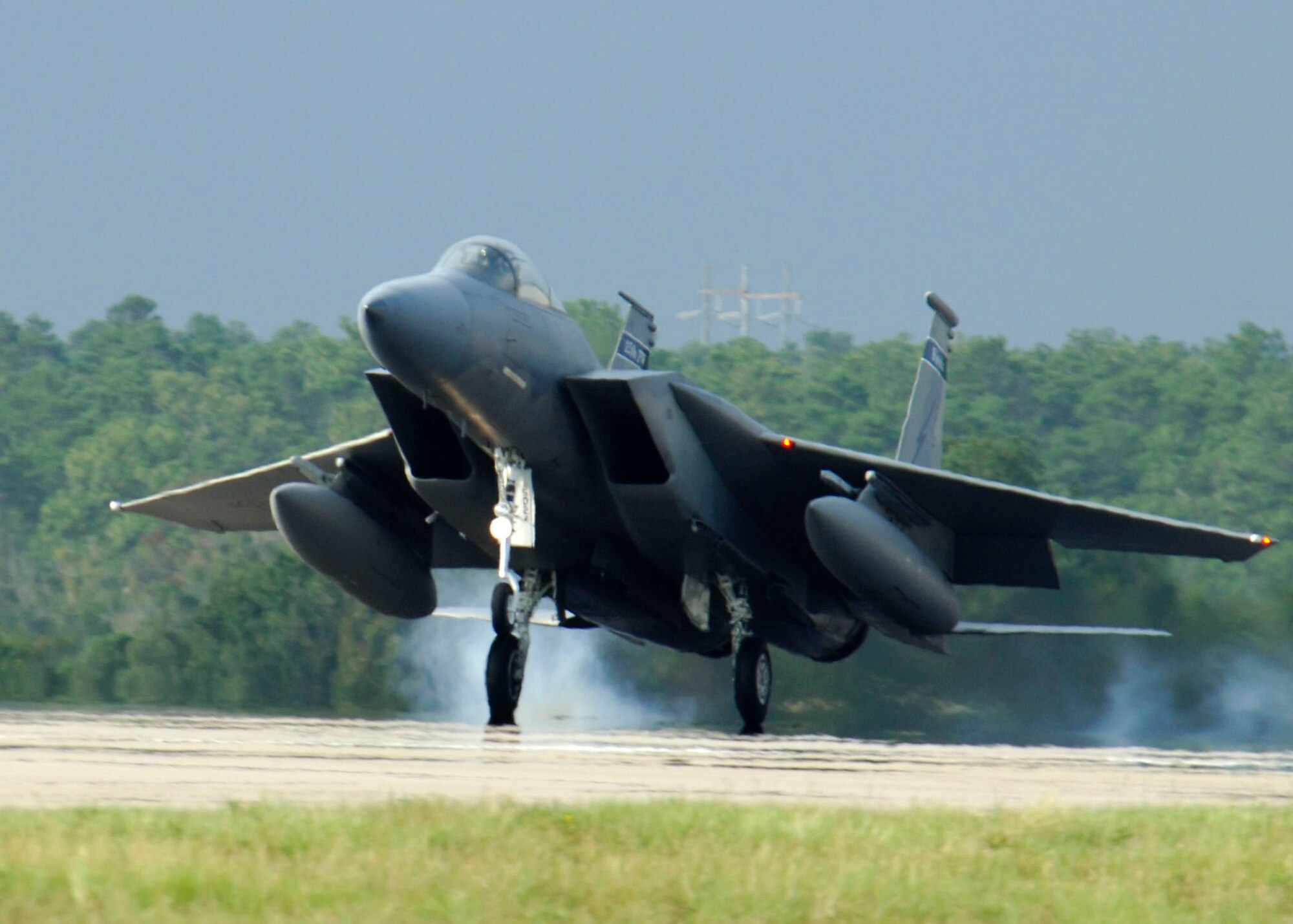 One of seven F-15 Eagles from the Florida Air National Guard's 125th Fighter Wing arrives at Eglin Air Force Base, Fla., Aug. 29. The aircraft were evacuated from Jacksonville International Airport because of Tropical Storm Ernesto. (U.S. Air Force photo/Joe Piccorossi) 
