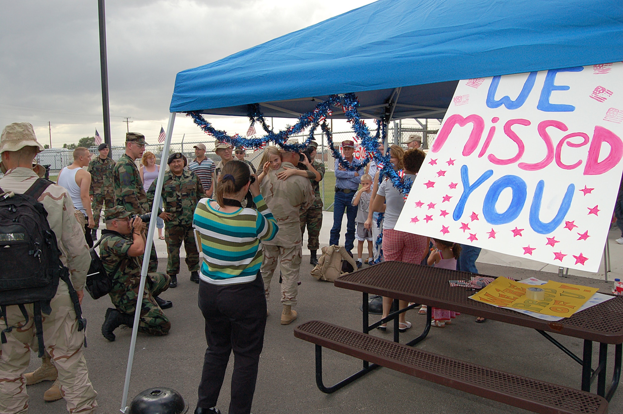 Thirteen Airmen meet family and friends during a welcome home party at the 47th Security Forces Squadron building at Laughlin Air Force Base, Texas Aug. 29, after serving a nine-month deployment in support of Operation Iraqi Freedom. (U.S. Air Force photo/Staff Sgt. Shad Eidson) 