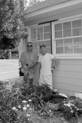 Maj. Brian Davis and Lt. Col Matt Young take a break from painting the satellite police station in Goldsboro, NC.