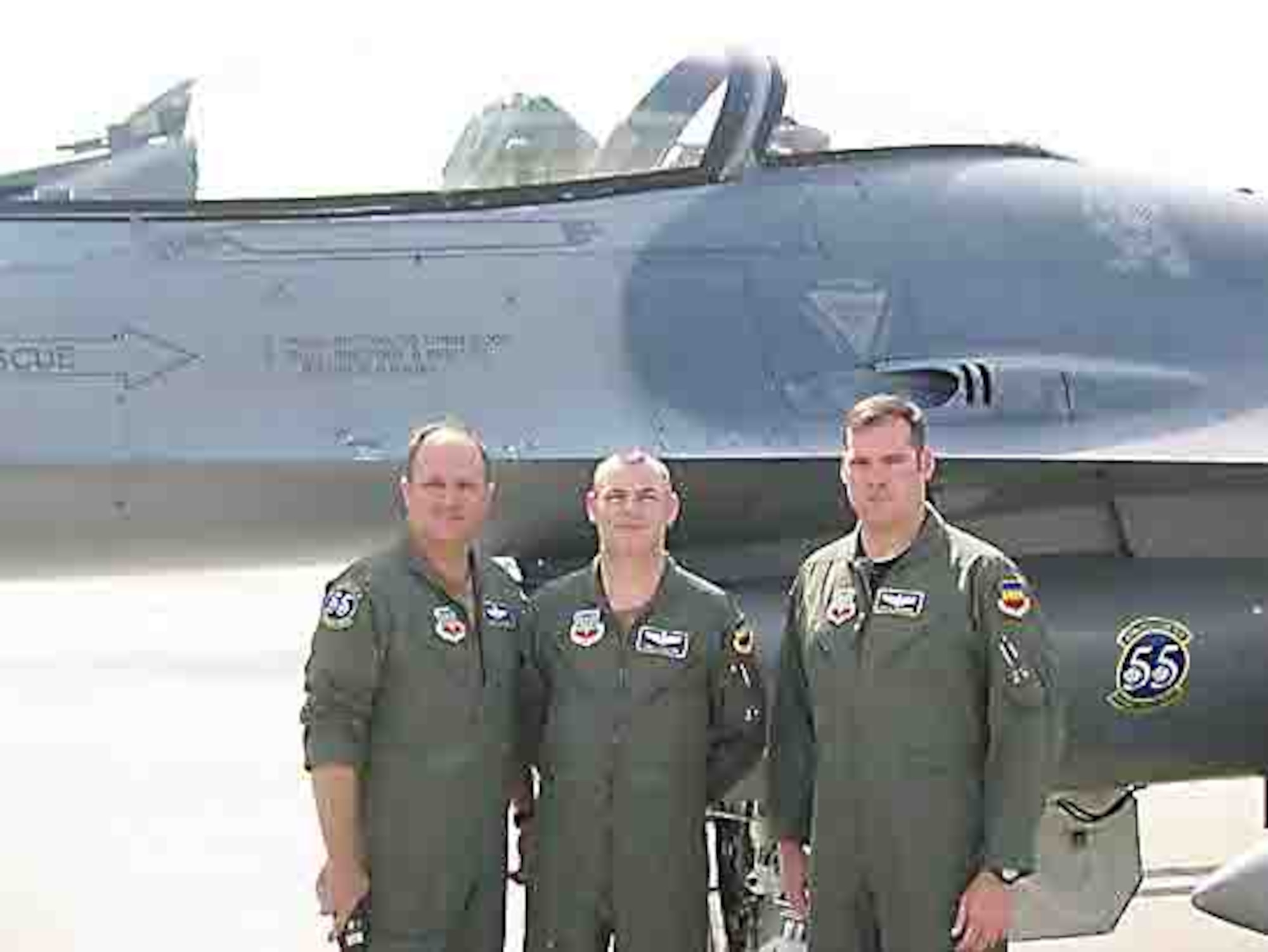 From left, Maj. Doug Schaare, Lt. Col. Thomas Littleton and Capt. Craig Simmons, 55th FS pilots, recently received the Air Crew of Distinction Award from Air Combat Command.  (Courtesy photo)