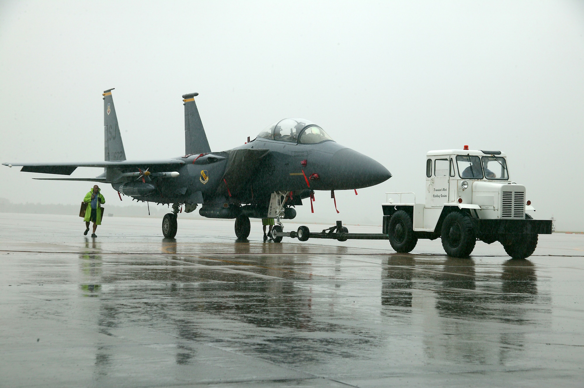 SHAW AIR FORCE BASE, S.C.-- Shaw maintainers store an F-15 aircraft from Seymour Johnson Air Force Base in a Shaw hangar in preparation for Tropical Storm Ernesto. (U.S. Air Force photo/Senior Airman John Gordinier)