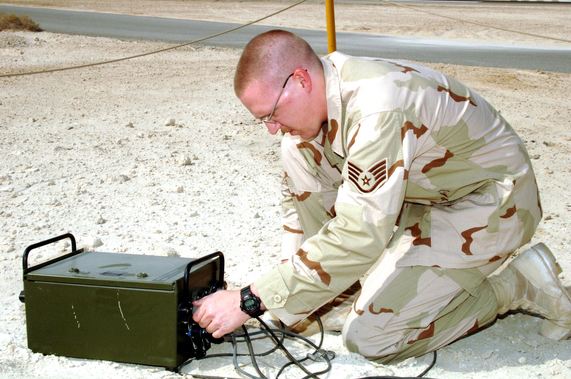 Staff Sgt. Levy Bland adjusts weather equipment in Southwest Asia. Sergeant Bland is a weather forecaster with the 380th Expeditionary Operations Support Squadron. (U.S. Air Force photo/Staff Sgt. Jason Webb) 

