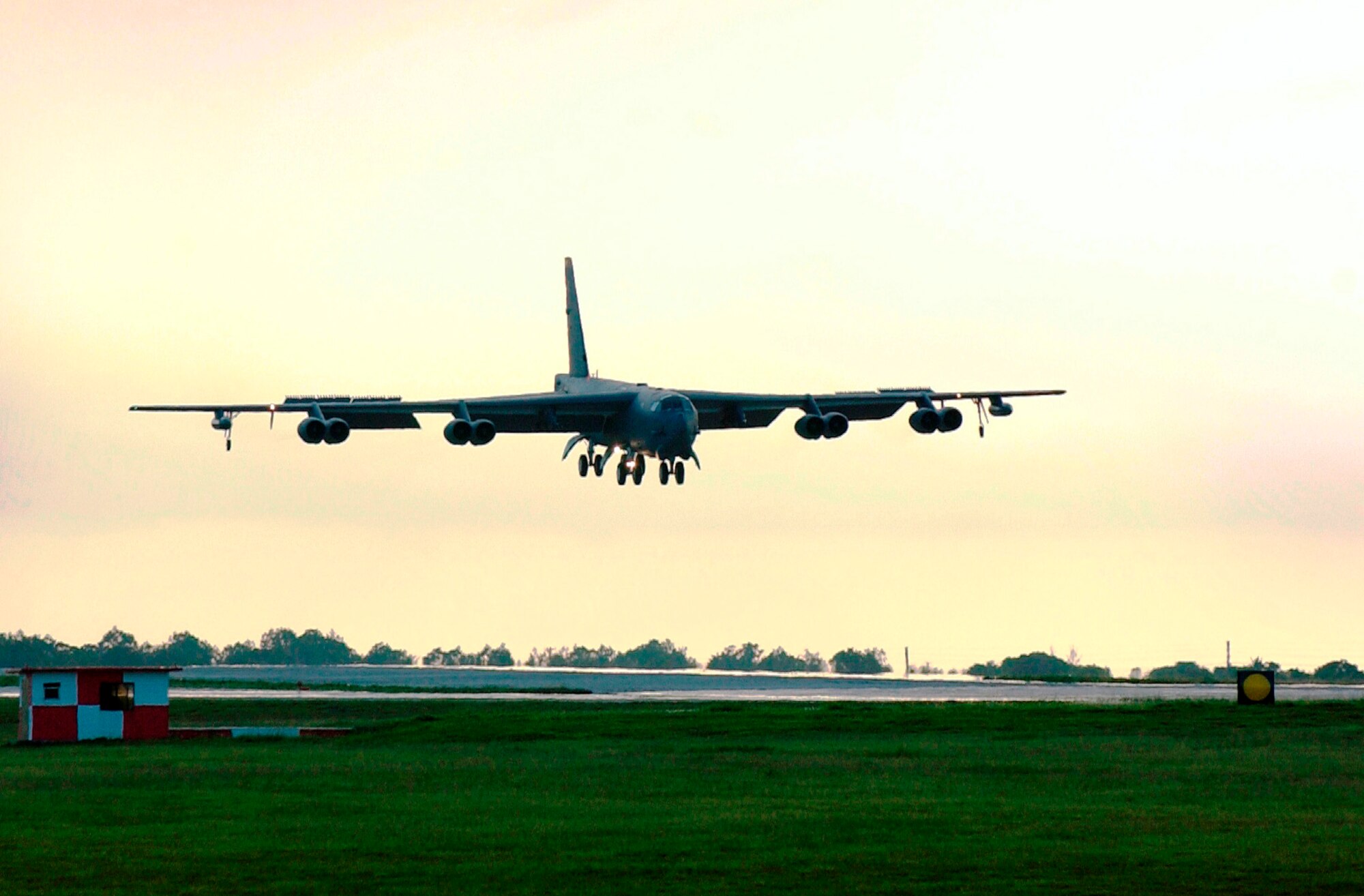 A 23rd Expeditionary Bomb Squadron B-52 Stratofortress prepares to land at Andersen Air Force Base, Guam, Aug. 30. The aircraft, from the 5th Bomb Wing at Minot AFB, N.D., is one of six scheduled to deploy to Andersen for four months. The aircraft, aircrews, support staff and maintainers will continue the mission of promoting regional security and preserving regional stability while providing a continuous bomber presence. (U.S. Air Force photo/Airman 1st Class Miranda Moorer)