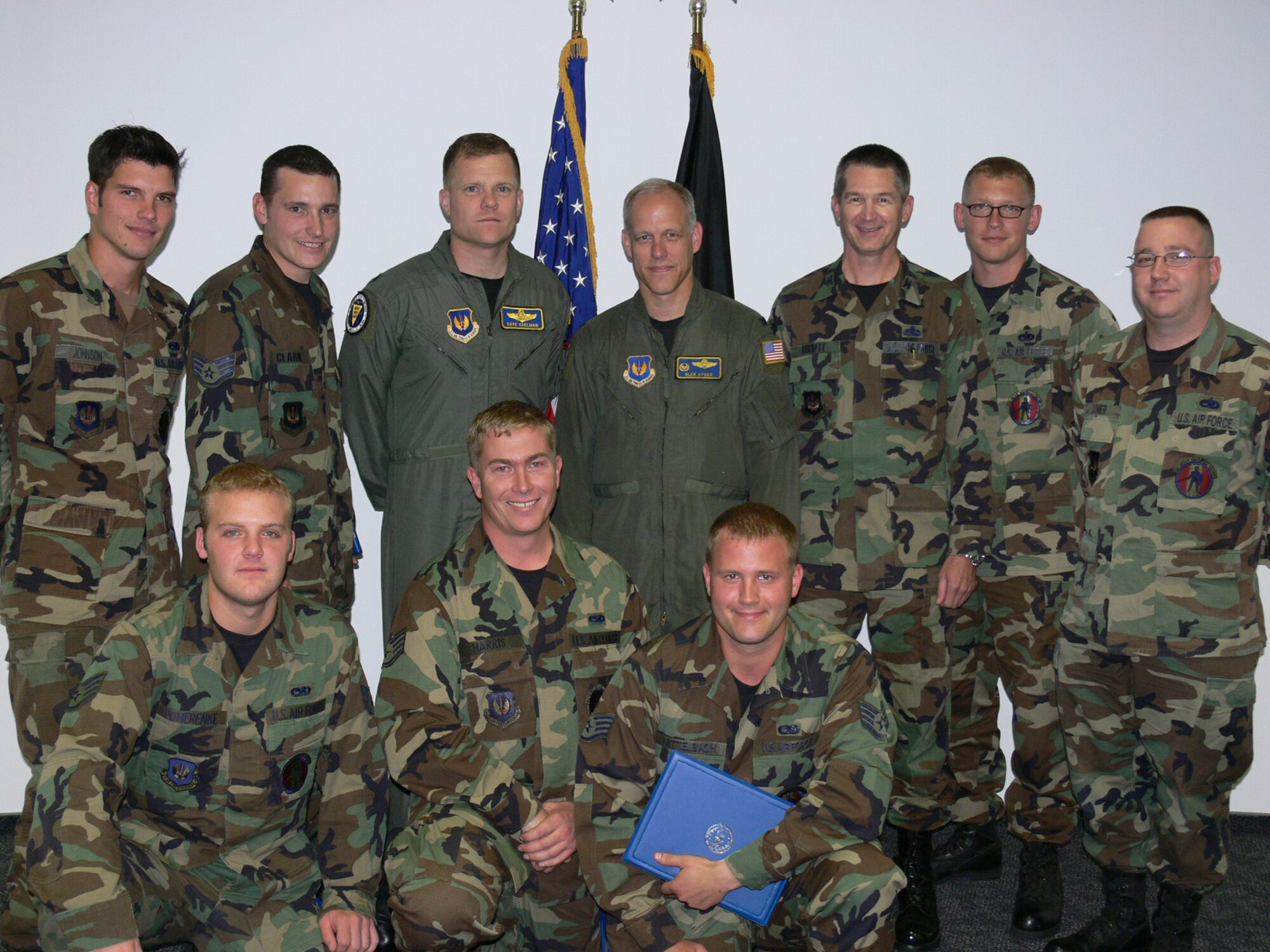 Lt. Col. David Uselman, 86th Operations Group deputy commander (back row, third from left), Col. Glen Apgar, 86th Airlift Wing vice commander (back row, center) and Col. Robert Burnett, 86th Maintenance Group commander (back row, third from right), congratulated seven Dedicated Crew Chiefs from the 86th Aircraft Maintenance Squadron after the DCC’s took their oath. Photo by Monica Mendoza.