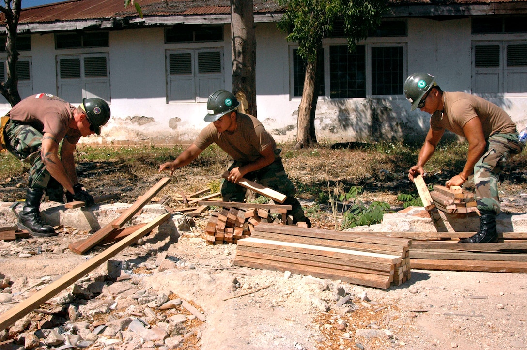 U.S. Navy Seabees with Naval Mobile Construction Battalion 40 construct benches at Johannes General Hospital in Kupang, Indonesia, Aug. 22, 2006. NMCB 40 is deployed aboard the hospital ship USNS Mercy that is conducting humanitarian and civic assistance missions during its five-month deployment to South Asia, Southeast Asia and the Pacific Islands. 