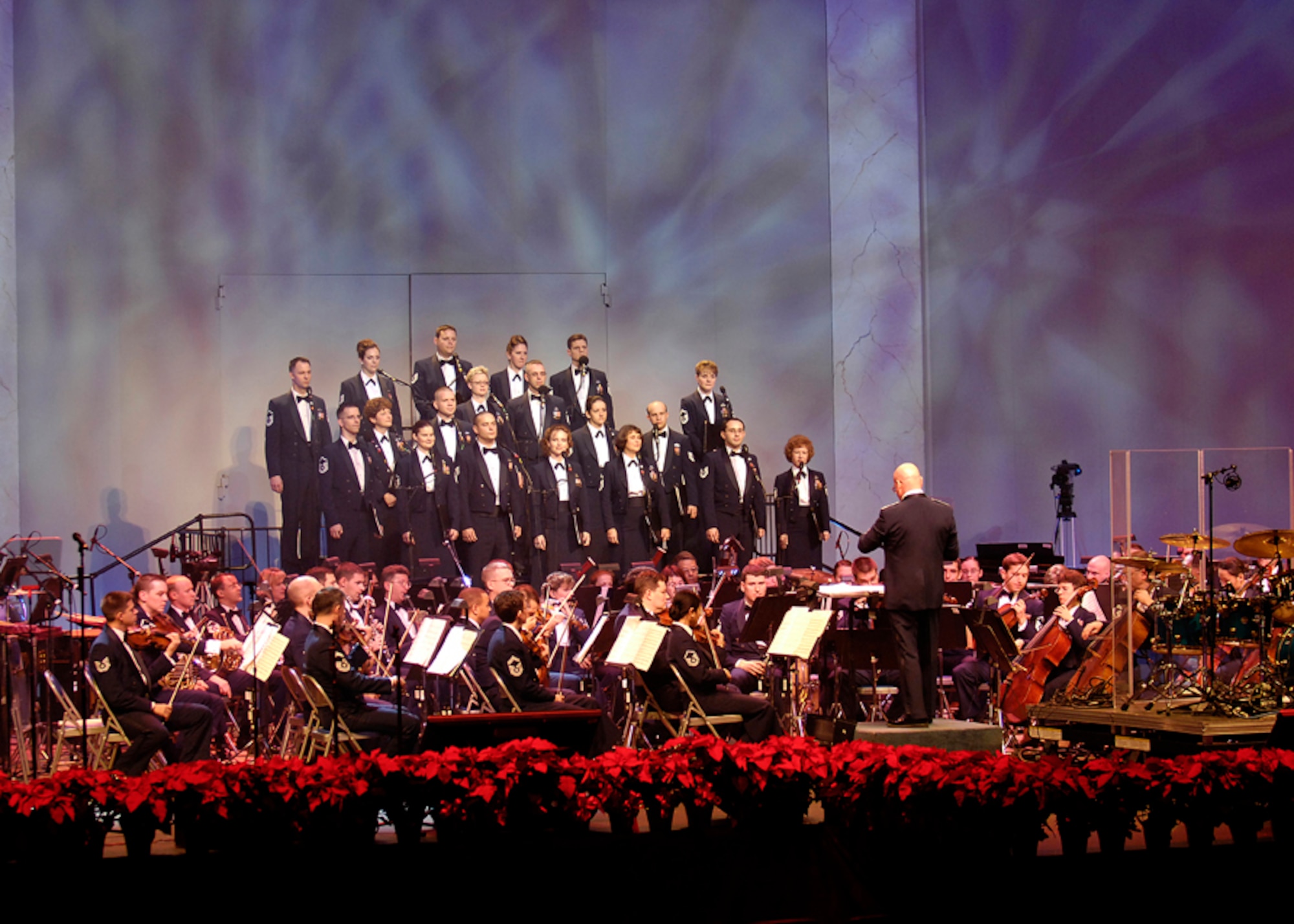 United States Air Force Symphony Orchestra performs during a holiday concert at the Daughters of American Revolution Constitution Hall in Washington Dec. 1, 2006. The Air Force Band to include Max Impact, The Air Force Symphony Orchestra and members of the Airman of Note performed for the first time at a holiday concert for students in the local area. (U.S. Air Force photo/Senior Airman Desiree Andrejcik)