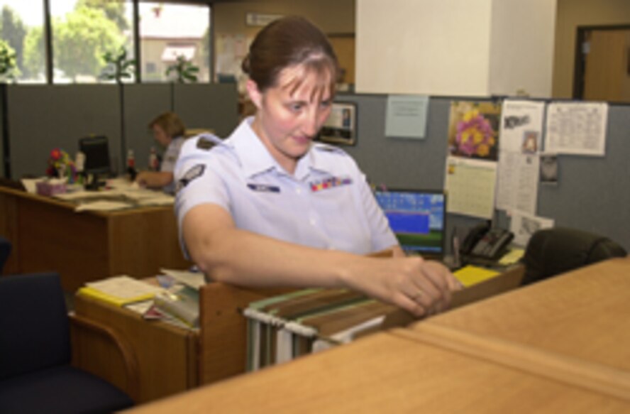 (Photo by Tech. Sgt. M. Davis) Senior Airman Elizabeth Sewell, a Personnel Employments journeyman with the 71st Mission Support Squadron, reviews the office records management plan in preparation of Vance’s Operational Readiness Inspection August 14-22.
