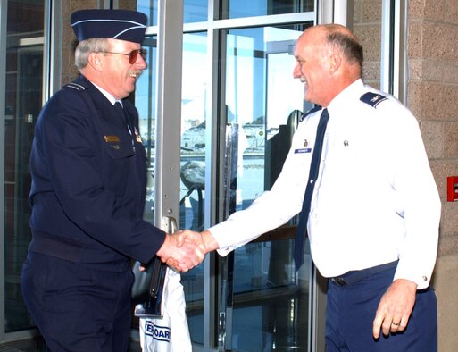 Col. Danny Seanger, 460th Space Wing vice commander, meets Air Vice Marshal Alfred Quaife, Air Commander, Australia, Nov. 30 at the Mission Control Station. Air Vice Marshal Quaife paid a visit to some of the members of the Royal Australian Air Force who are stationed here as part of his visit to Buckley to gain a better understanding of what his troops bring to the space mission.             