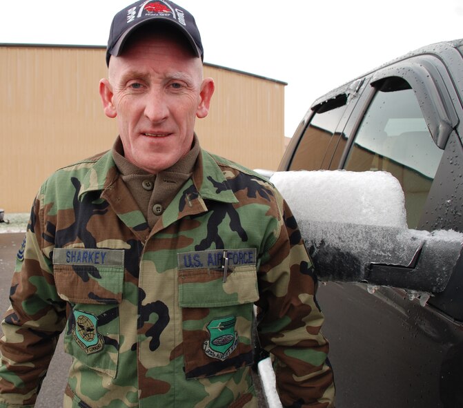 Weather changes quickly from 68 degrees on Wednesday to 24 degrees Friday.  Tech Sgt. Brian Sharkey shivers at Scott Air Force Base as winter returns to the 932nd Airlift Wing.  Photo/Capt. Stan Paregien