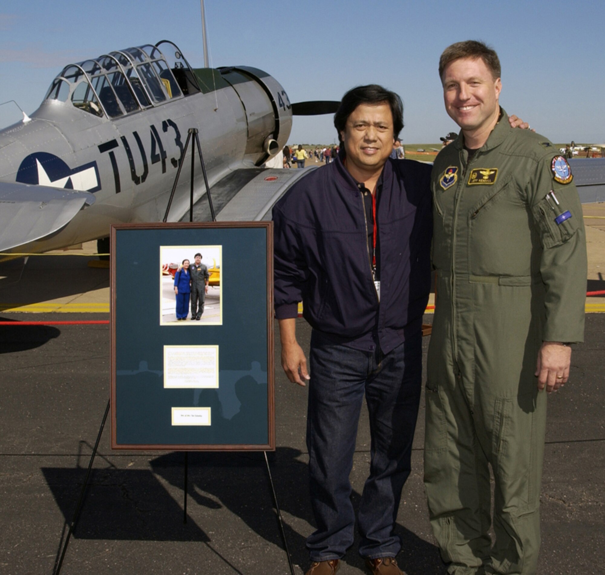 Tito Tolentino and Col. Jeffrey Kendall, 80th Flying Training Wing commander, at air show in October 2005. Tito and Dr. Elvie Tolentino were inducted into the ENJJPT Hall of Fame for their role as nation sponsors.         